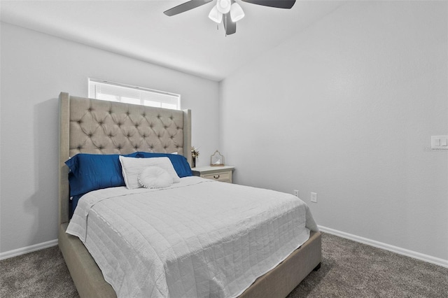 bedroom featuring dark colored carpet and ceiling fan