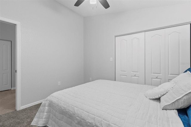 bedroom featuring carpet, ceiling fan, and a closet