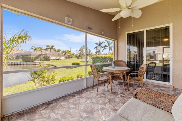 sunroom / solarium with ceiling fan