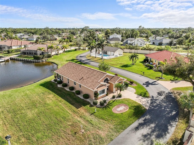 drone / aerial view featuring a water view