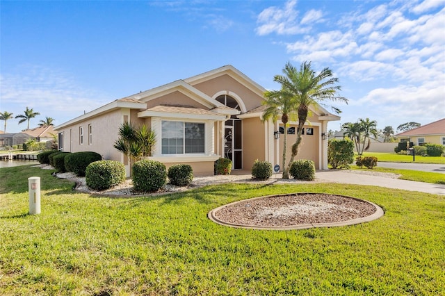 ranch-style home featuring a front lawn