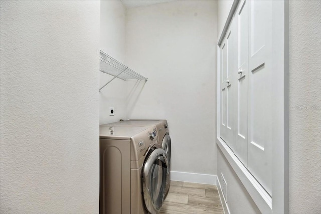 laundry area featuring independent washer and dryer