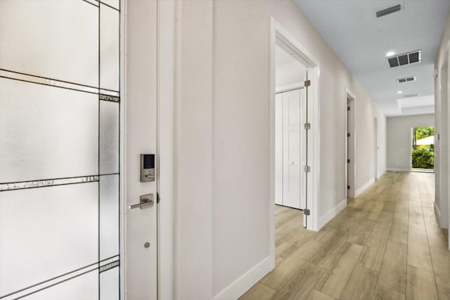 hallway featuring light wood-type flooring