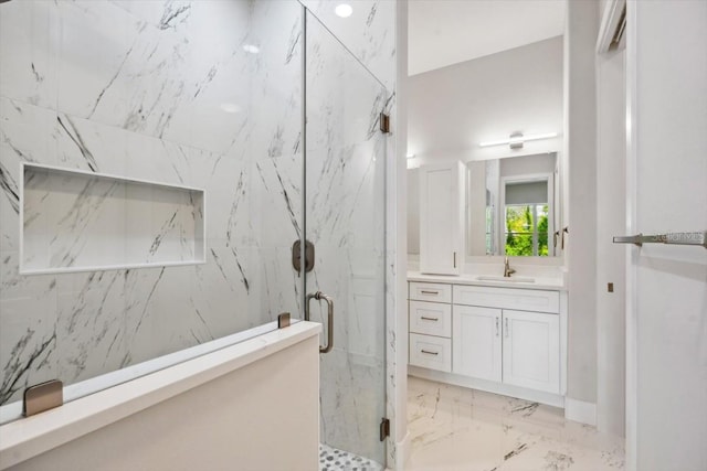 bathroom with vanity and walk in shower