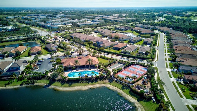 drone / aerial view with a water view