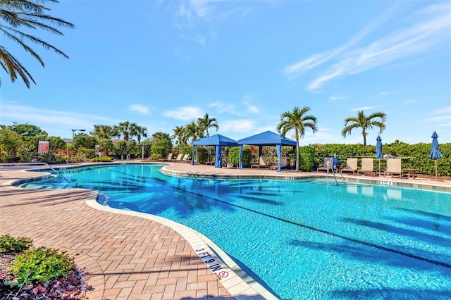 view of swimming pool with a gazebo