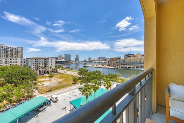 balcony featuring a water view