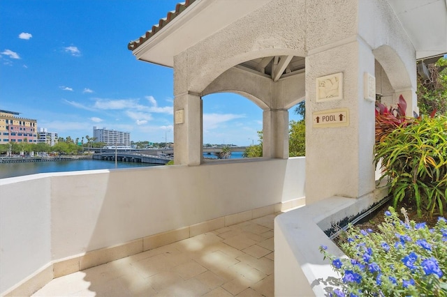 view of patio / terrace with a water view