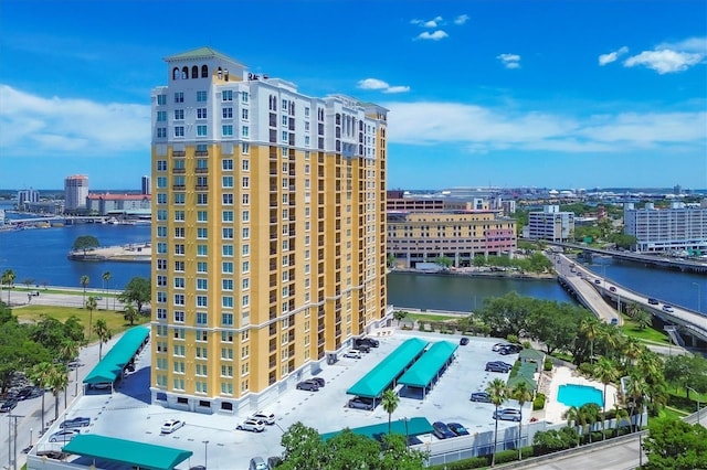 birds eye view of property with a water view