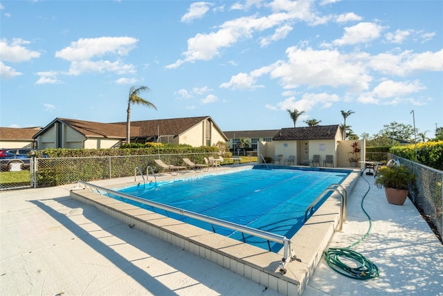 view of pool featuring a patio