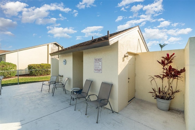 rear view of property with a patio area