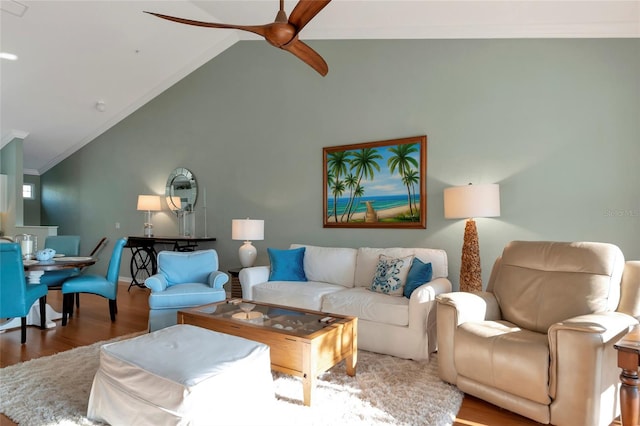 living room with lofted ceiling, ceiling fan, crown molding, and hardwood / wood-style floors