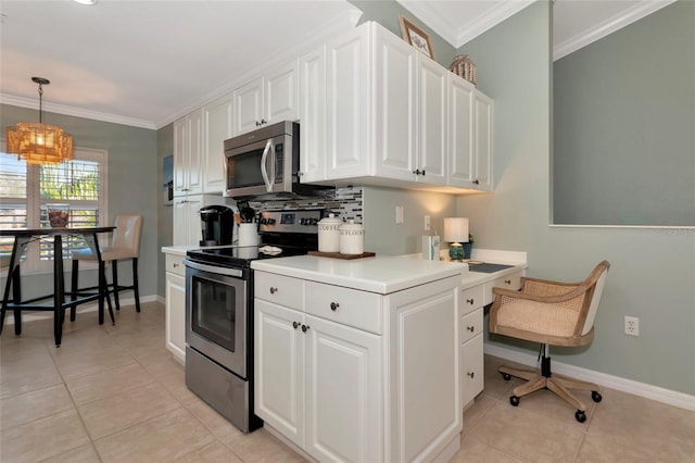 kitchen with white cabinets, stainless steel appliances, hanging light fixtures, and light tile patterned floors