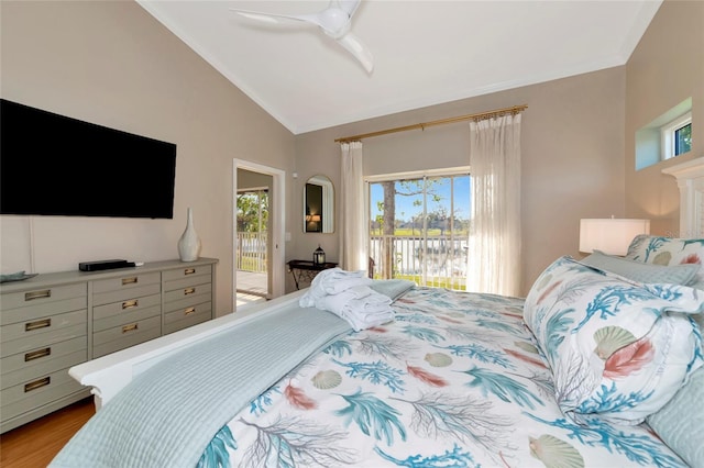 bedroom with vaulted ceiling, hardwood / wood-style flooring, ceiling fan, and access to exterior