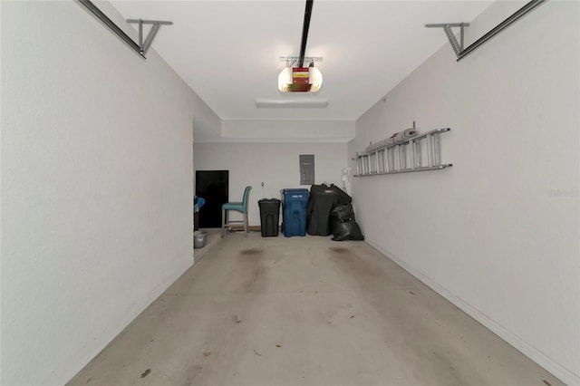 garage with electric panel and a garage door opener