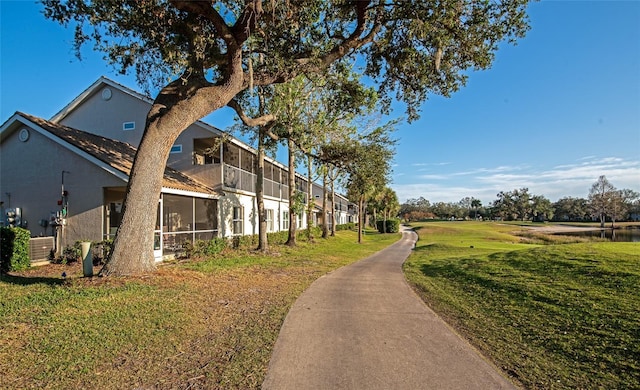 view of community featuring a lawn