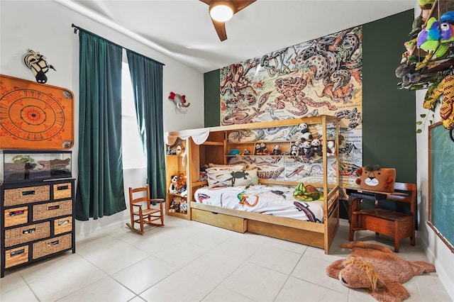 bedroom featuring tile patterned floors and ceiling fan