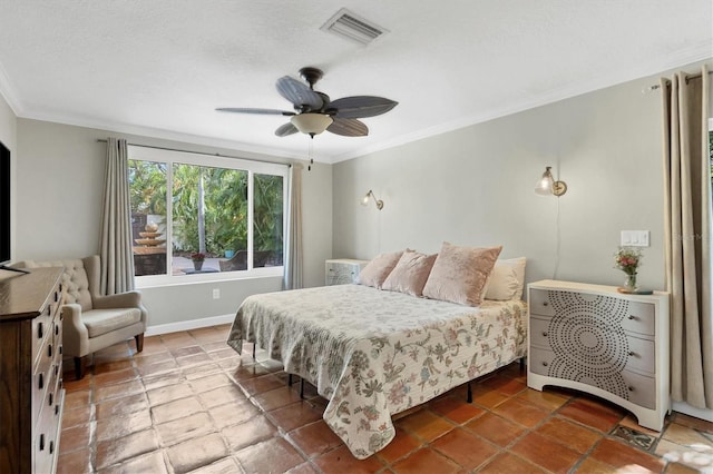 bedroom with a textured ceiling, ceiling fan, and crown molding