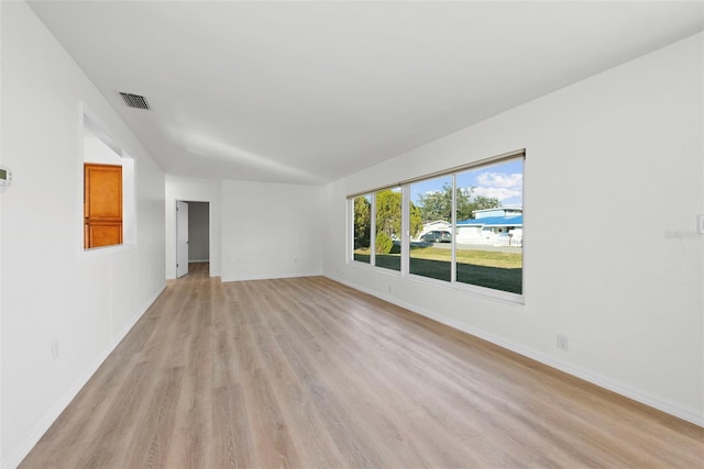 unfurnished room featuring light hardwood / wood-style flooring