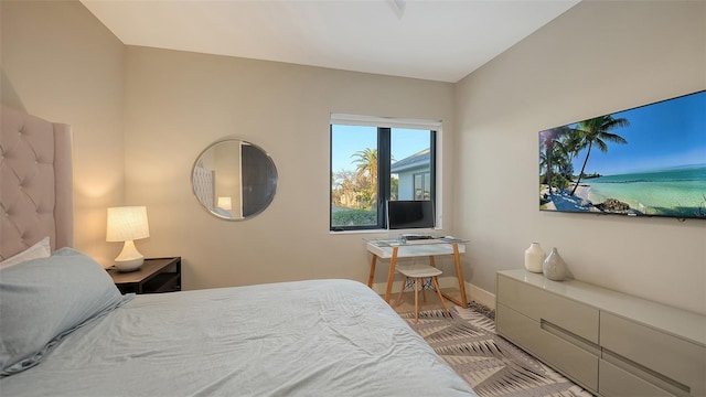 bedroom with light wood-type flooring