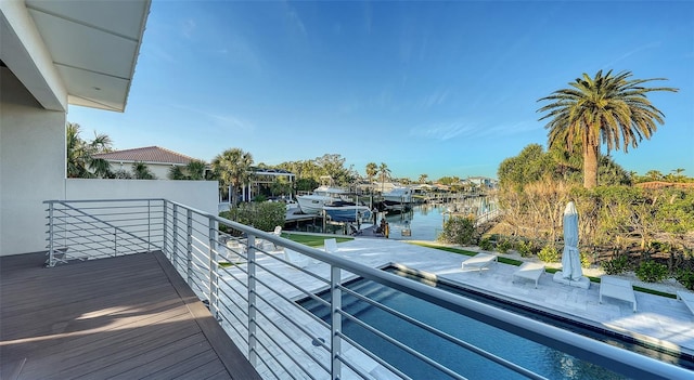 balcony featuring a water view