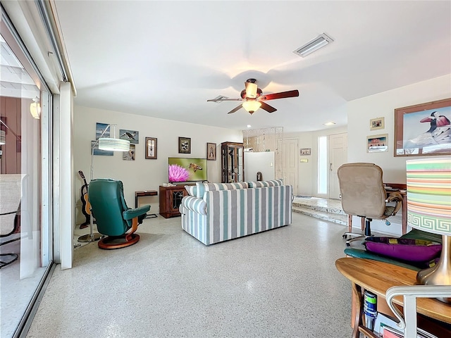 living room with ceiling fan