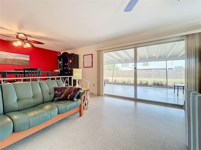 living room featuring ceiling fan