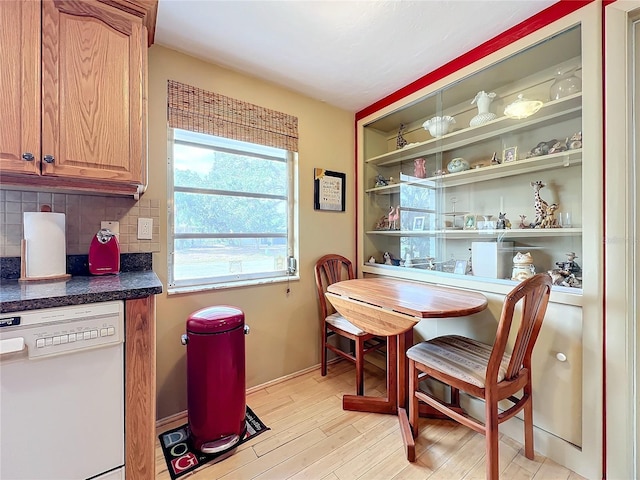 dining space with light hardwood / wood-style flooring