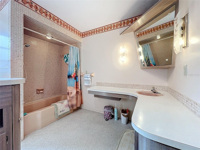 bathroom featuring vanity and shower / tub combo