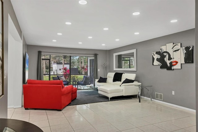 living room with light tile patterned floors