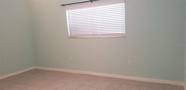 view of tiled spare room