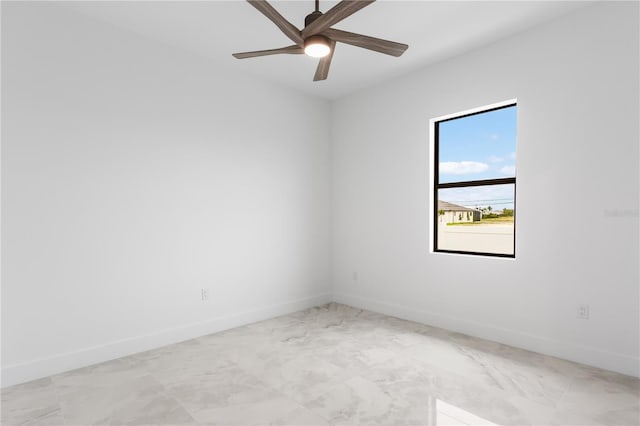 spare room featuring ceiling fan