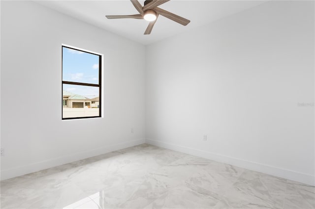 spare room featuring ceiling fan