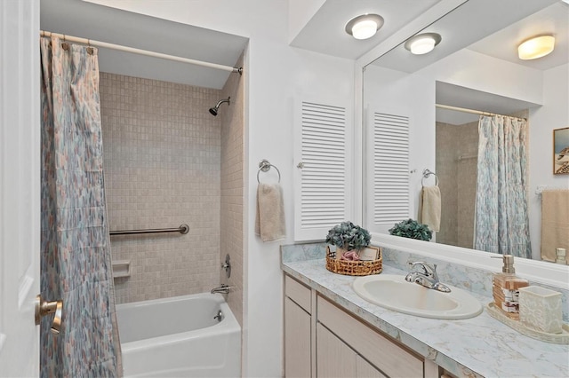 full bathroom featuring vanity and shower / bath combo with shower curtain