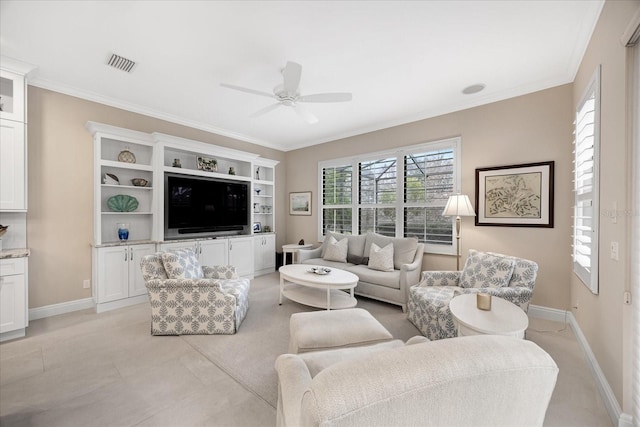 living room featuring ceiling fan and ornamental molding