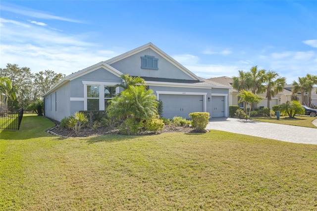 single story home with a front lawn and a garage