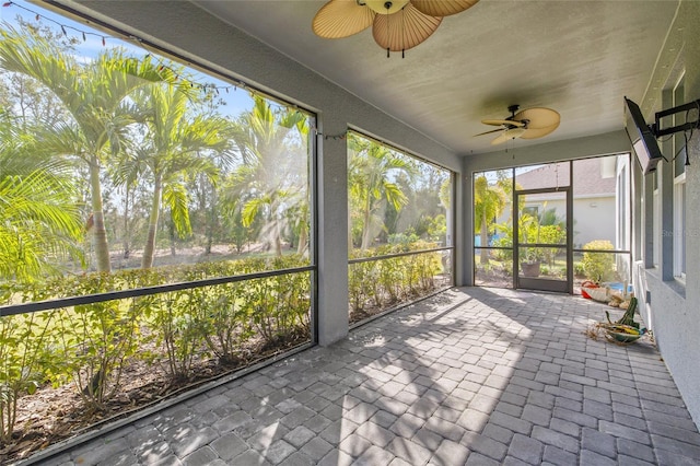 unfurnished sunroom featuring a healthy amount of sunlight