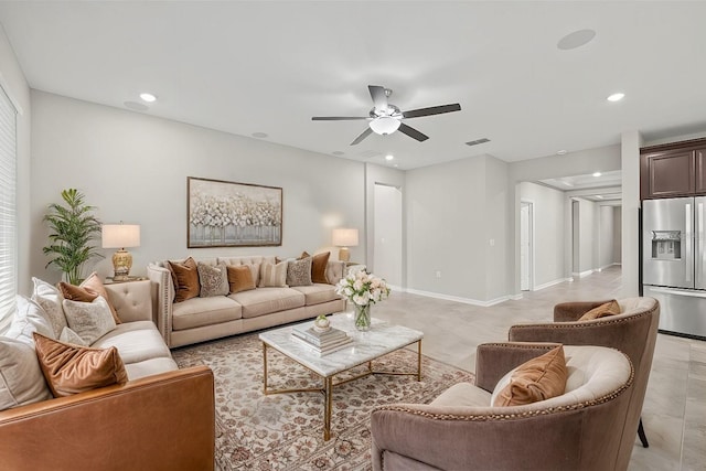 living area featuring recessed lighting, visible vents, and ceiling fan