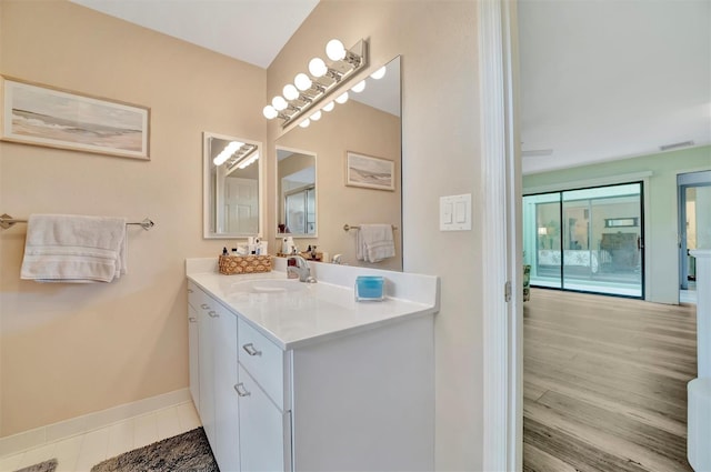 bathroom featuring tile patterned floors and vanity