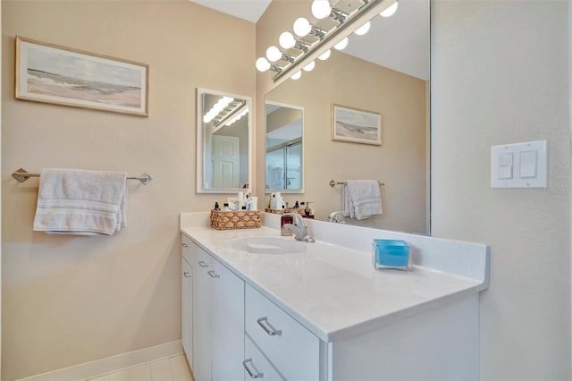 bathroom featuring vanity and tile patterned flooring