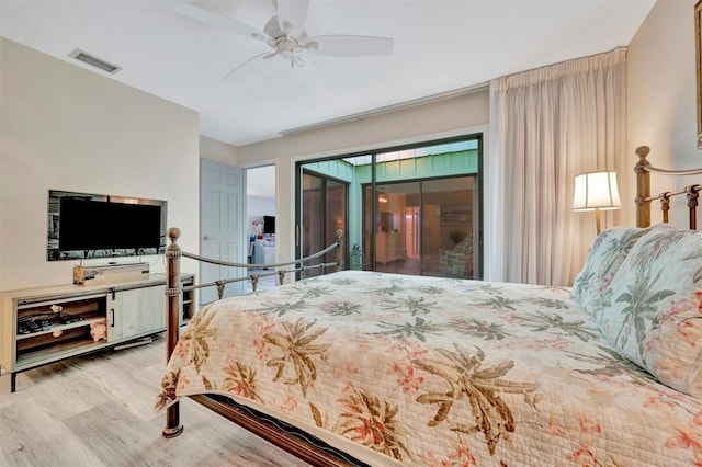 bedroom featuring ceiling fan, access to exterior, and light hardwood / wood-style floors