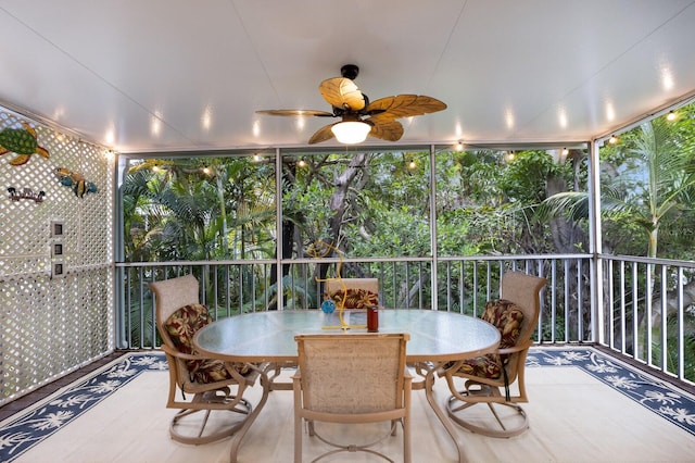 sunroom / solarium with ceiling fan and a healthy amount of sunlight