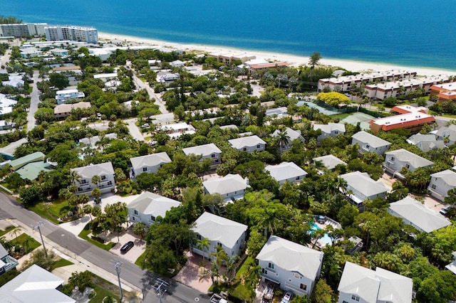 drone / aerial view with a view of the beach and a water view