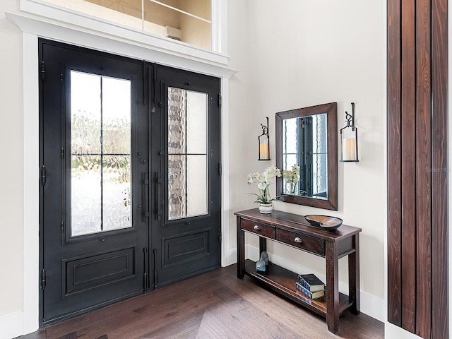 entrance foyer with hardwood / wood-style floors and french doors