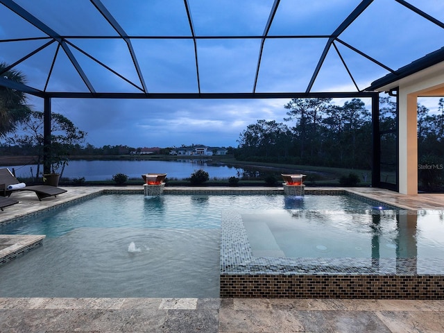 view of swimming pool featuring a lanai, pool water feature, a water view, and a patio