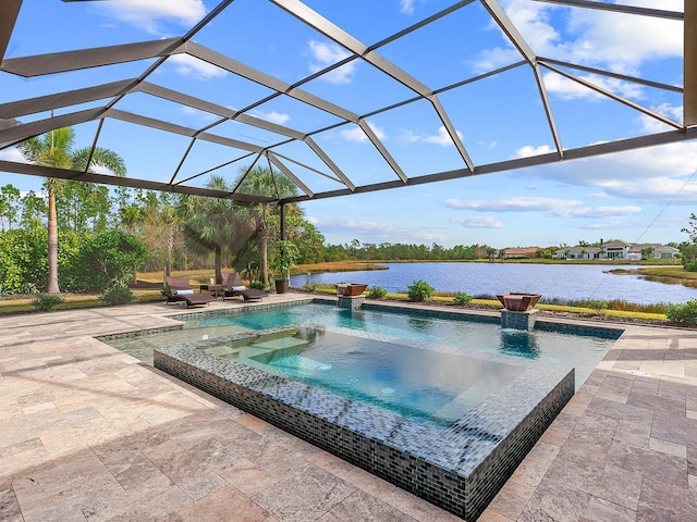 view of pool featuring an in ground hot tub, a lanai, a water view, and a patio