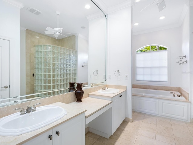 bathroom with independent shower and bath, crown molding, tile patterned floors, and vanity