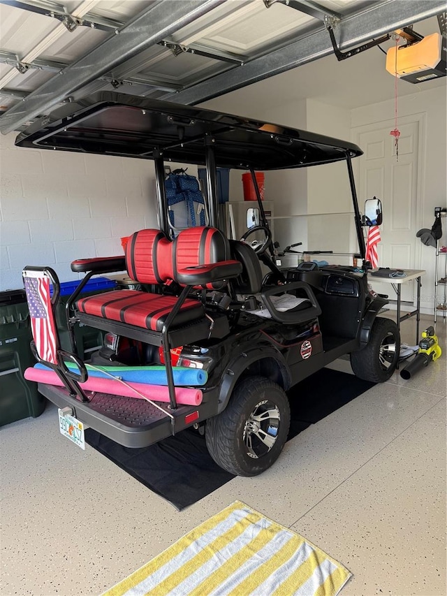 garage featuring a garage door opener