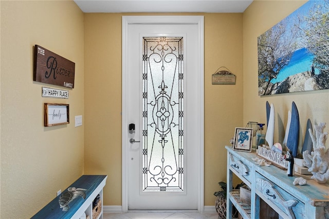 view of tiled foyer entrance