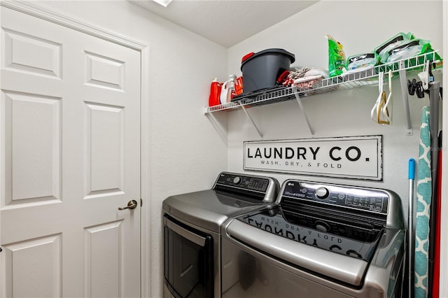 laundry area with washer and clothes dryer